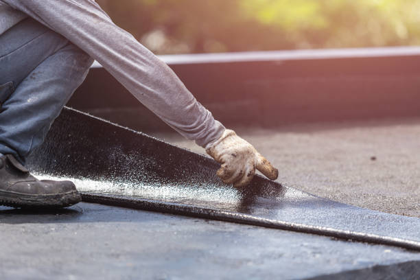 Professional Basement Waterproofing technician working in Sylvania, OH